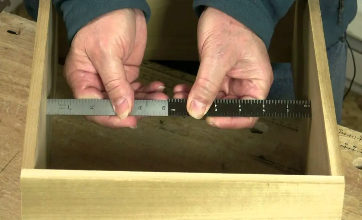 Measure And Cut The Wooden Boards For The Base